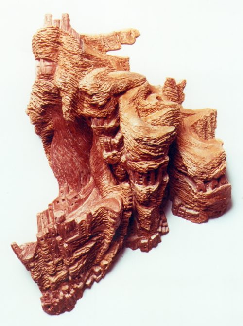 Tête de serpent trogoldytes. H 0m 60, l 0m 50.